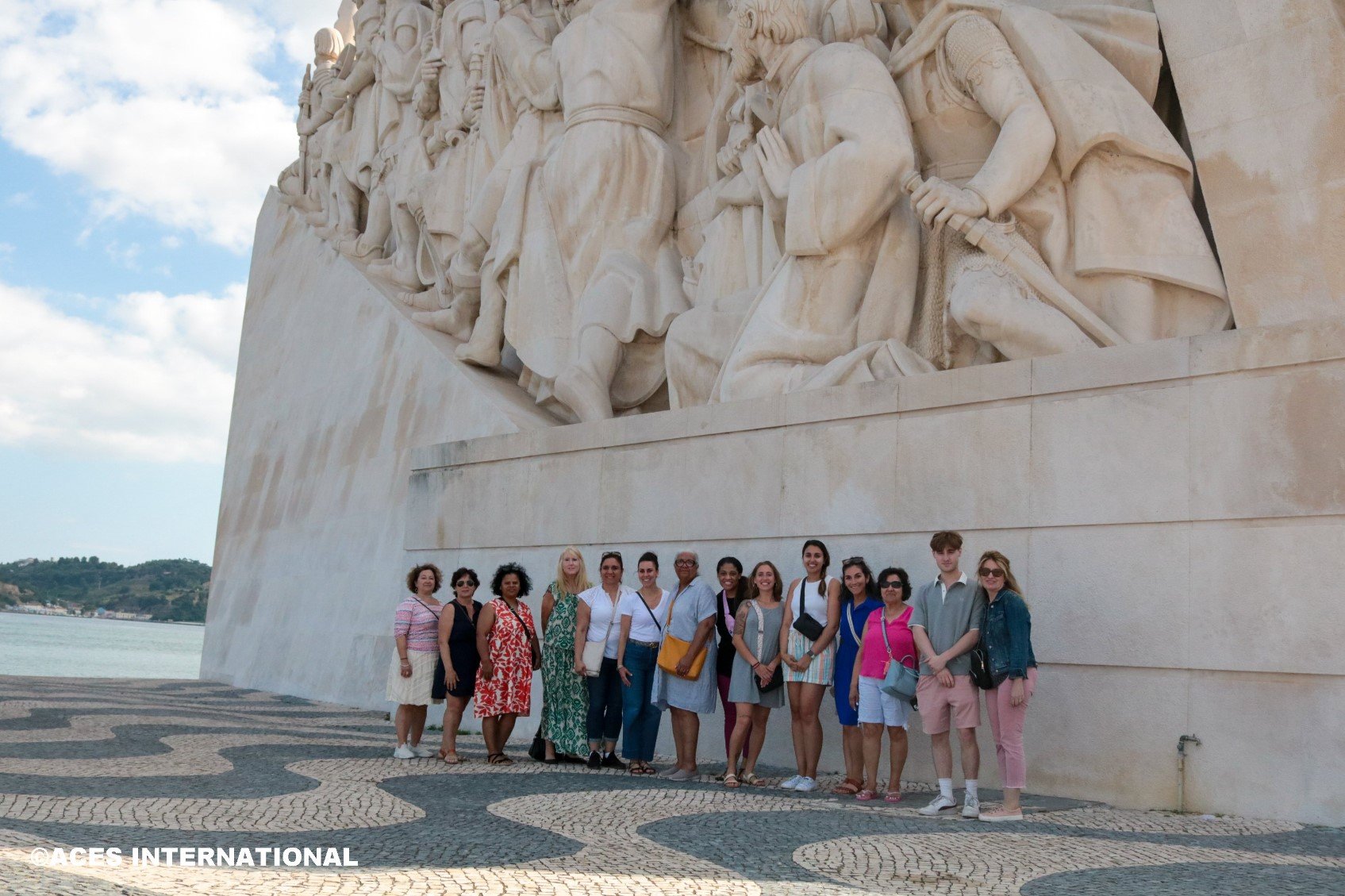 The entire Educators Field Study group poses for a photo in front of The Monument to The Discoveries, located in Portugal.